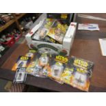 Quantity of De Agostini diecast metal Star Wars figures, in original packs and some with comics