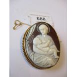 19th Century gilt metal mounted cameo brooch depicting the Madonna and Child with a woven hair inset