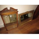 Rectangular gilt framed wall mirror with pierced iron frame, 31ins x 22ins together with a