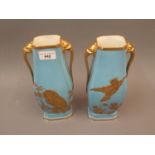 Pair of 19th Century Worcester rectangular baluster form vases with gilt mask head handles and