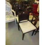 Set of four contemporary dark stained wood dining chairs