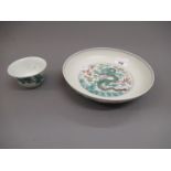 Chinese circular shallow bowl with dragon decoration, signed with six character mark to base, 8ins