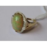 Large 18ct yellow gold opal and diamond ring, 10.2g, the opal 17mm x 14mm Ring size O