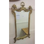 Reproduction carved gilt wood wall mirror, 35ins high together with a modern rectangular gilt framed