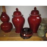 Pair of large reproduction Chinese sang du boeuf temple jars with hardwood bases, 20ins high