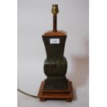 Modern Chinese bronze baluster form square lamp base with stylised decoration and brown and green