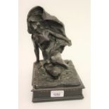 Early 20th Century dark patinated bronze figure of a seated girl with a billowing shawl, on a