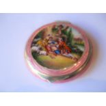 Continental 925 silver and pink enamel compact, the cover decorated with figures in a landscape (