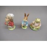Three Beswick Beatrix Potter figures with gold back stamps, ' Jeremy Fisher ', ' Peter Rabbit '
