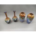 Pair of Royal Doulton baluster form stoneware vases with relief moulded floral decoration, 8.75ins