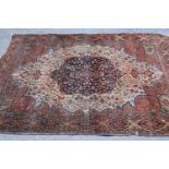Tabriz rug with a medallion and all-over stylised floral design, with corner designs on an ivory