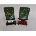 Pair of Chinese miniature cloisonne panels decorated with birds, insects and flowers, on hardwood