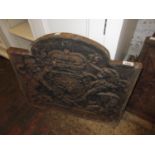 Reproduction cast iron fire back relief moulded with a Royal crest, 23ins x 20ins