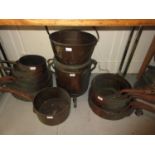 Large copper two handled cylindrical cooking vessel with lid, together with a quantity of similar