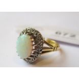 18ct Yellow gold oval opal and diamond cluster ring, 5.4g