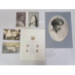 Large head and shoulder portrait photograph of Queen Marie of Romania in an oval mount with