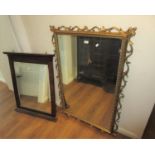 Modern composition gilt framed rectangular wall mirror in Florentine style, 32ins x 48ins together