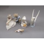 Lladro group of a boy and girl, small Lladro bust of a Spanish girl with oranges, together with a
