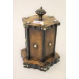 Victorian walnut and gilt brass mounted cigar stand of hexagonal design with mechanical action, 9ins