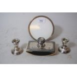 Sterling silver mounted photograph frame, pair of silver taper sticks and a 925 silver mounted