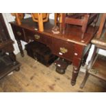 Late 19th / early 20th Century writing / dressing table having moulded top above three drawers