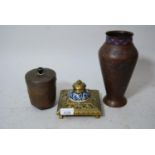 Cast brass inkwell stand with blue and white porcelain well having brass cover, circular copper