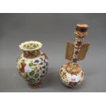 Two Zsolnay floral decorated vases with pierced and gilded decoration, 10ins high and 7.5ins high