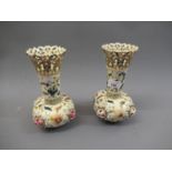 Pair of Zsolnay flared rim baluster form vases with floral decoration and pierced rims, 8.5ins