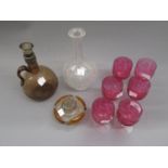 Set of six Cranberry cut and polished drinking glasses, two decanters and a perfume bottle (at