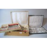 Cased French silver plated twelve place setting canteen of cutlery, together with a cased silver