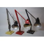 Group of three mid 20th Century anglepoise lamps by Herbert Terry & Sons Ltd. (one re-painted red)