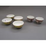 Set of four Chinese rice bowls decorated with butterflies and moths on a yellow ground , signed with