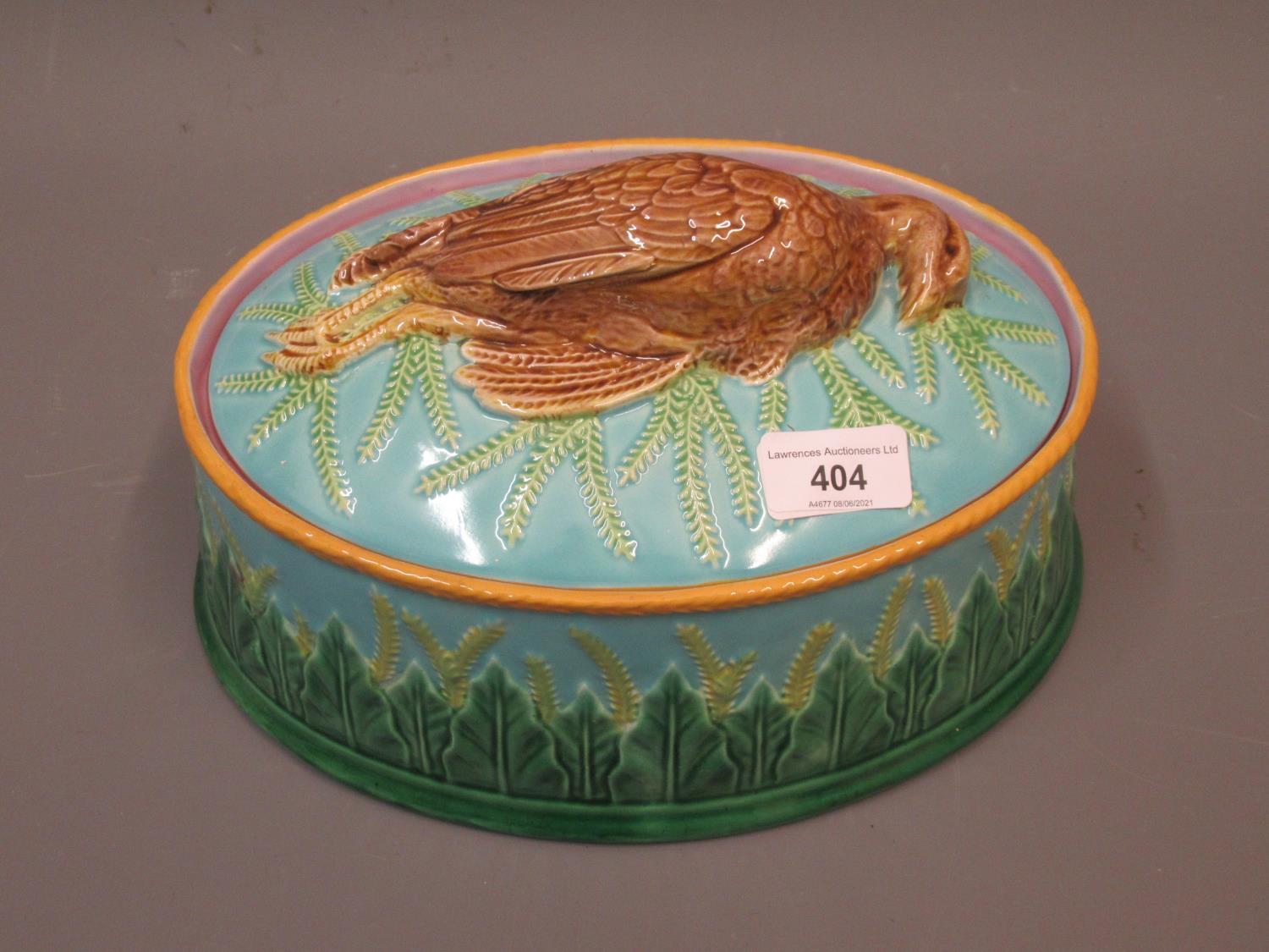 19th Century George Jones oval Majolica tureen and cover, the cover mounted with a figure of a