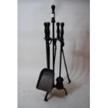 Iron fireside tool set on matching stand