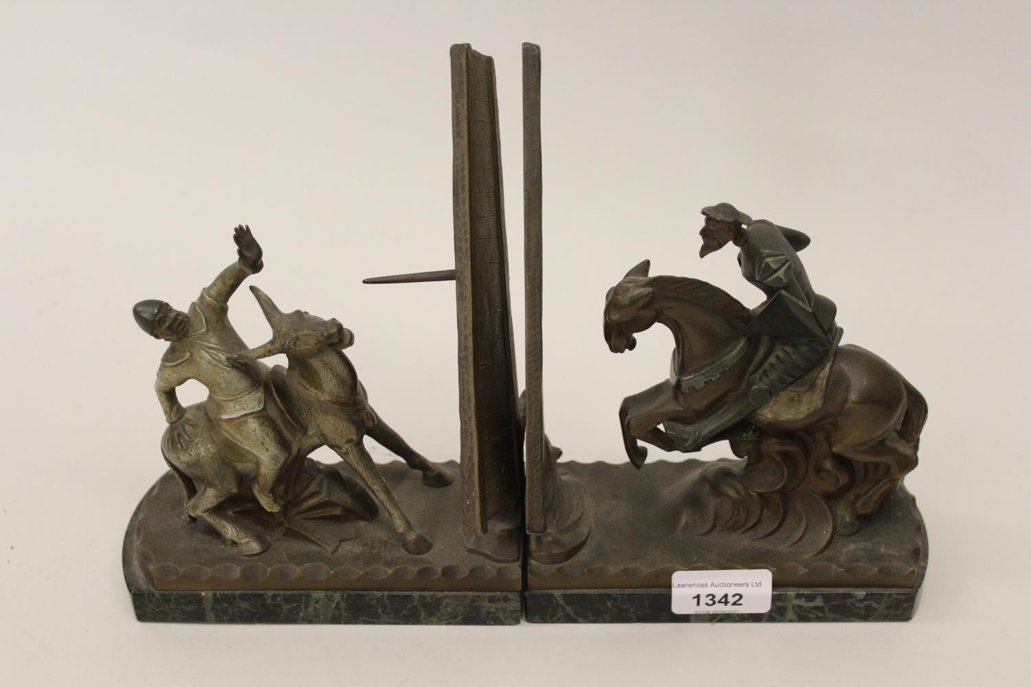 Richard W. Lange, pair of Art Deco brown patinated bronze figures in the form of Don Quixote and