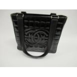 Chanel black patent leather Choco Bar CC tote bag, measures 21cm x 24cm x 8cm This was purchased