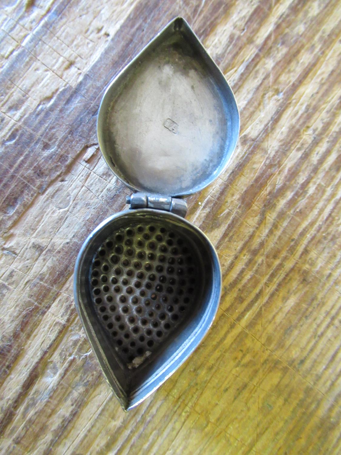 18th Century white metal nutmeg grater of tear drop form with engraved stylised floral decoration, - Image 7 of 8