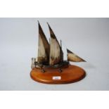 Continental silver model of a sailing boat, on mahogany stand (possibly Maltese), 11.5ins high x