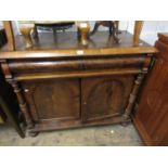 Victorian mahogany chiffonier, the deep moulded top above a concealed drawer, two arched panel doors