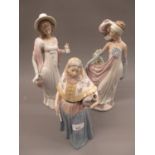 Two Lladro figures of ladies, 14ins and 11.5ins tall, together with Lladro Regency lady figure (at