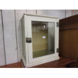 20th Century white painted metal table top shop display cabinet, having single glazed door and three