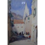 Arthur Knighton Hammond, watercolour, figures in a Continental street scene, signed, 23.5ins x