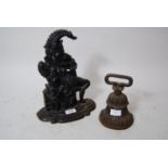 Victorian cast iron doorstop marked AR and Sons together with a later cast iron doorstop in the form