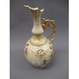 Zsolnay baluster form jug vase with naturalistic gilded handle and floral decoration, 12ins high