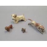 Small Austrian cold painted bronze figure of a terrier, 2ins long together with a similar figure