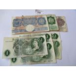 Seven various Bank of England one pound notes together with a Bank of England ten shilling note