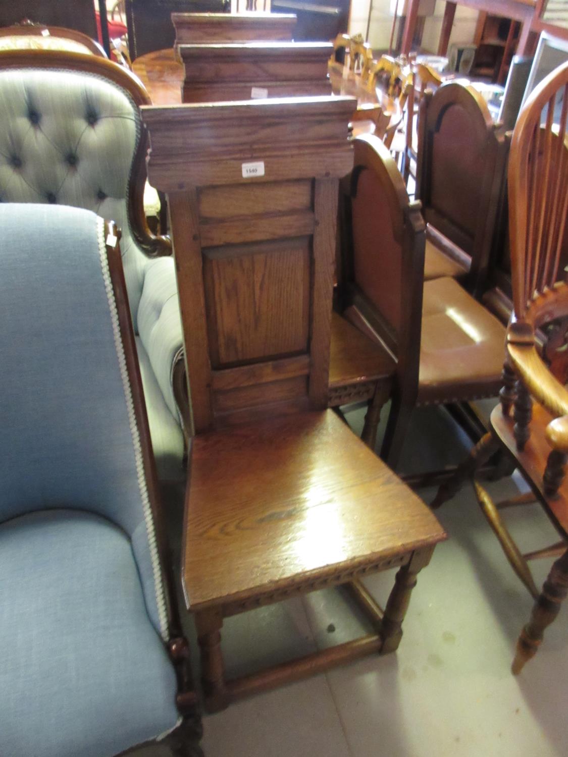 Set of three good quality reproduction oak side chairs, the moulded and fielded panel backs above