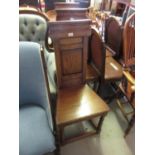 Set of three good quality reproduction oak side chairs, the moulded and fielded panel backs above