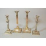 Pair of late 19th Century plate on copper Corinthian column candlesticks, 12.5ins high together with
