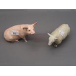 Beswick pottery figure of a pink seated pig, signed John Beswick to the base, together with a bisque